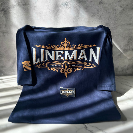 LineMan 'Living The High Life' navy t-shirt with matching sticker and LineCrate flag logo.