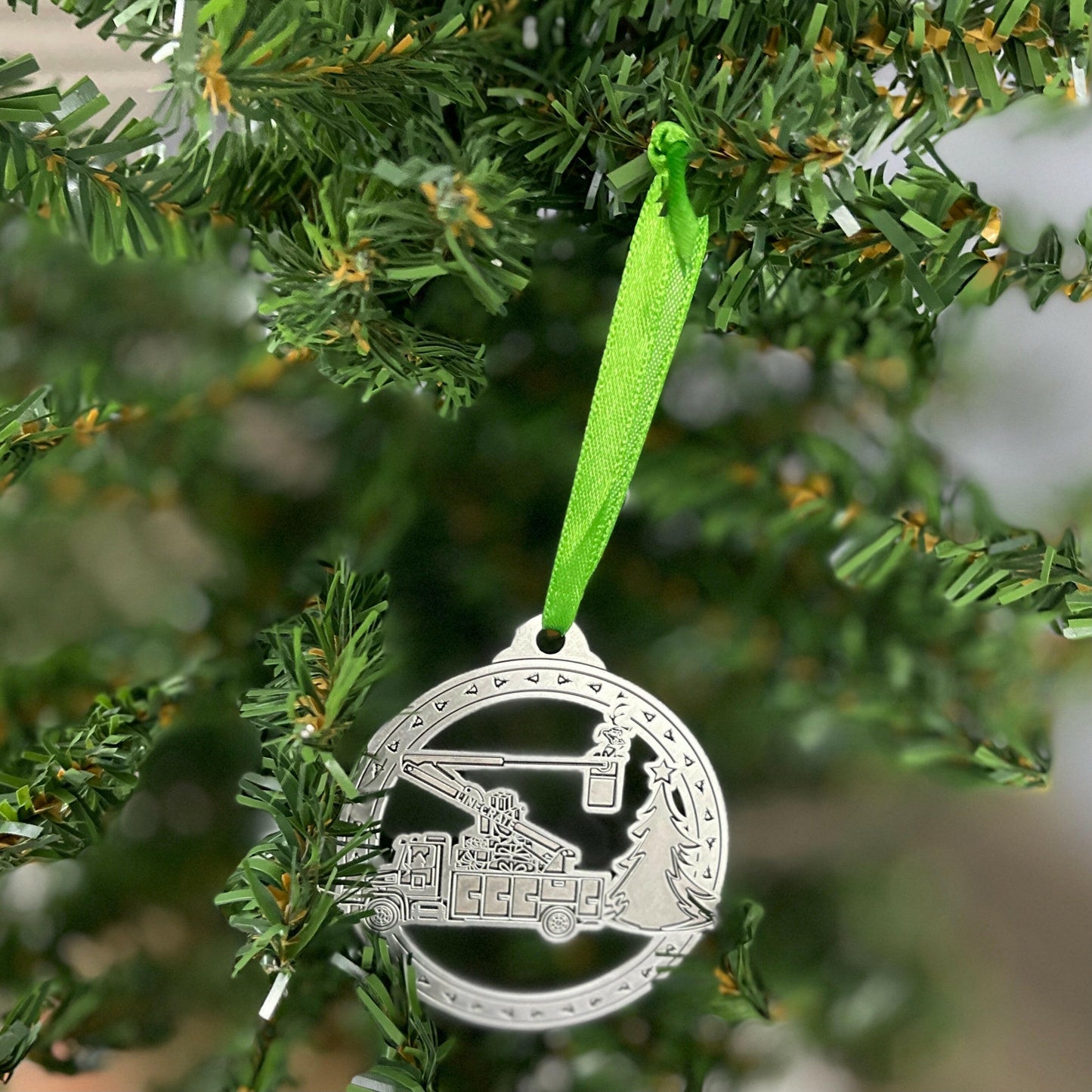 LineFamily LineLife Max in Bucket Truck LinePup Grinch holiday Christmas ornament in tree