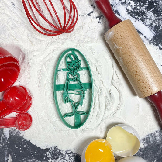Jolly Green Lineman Grinch Christmas cookie cutter - USA Made on Baking Background