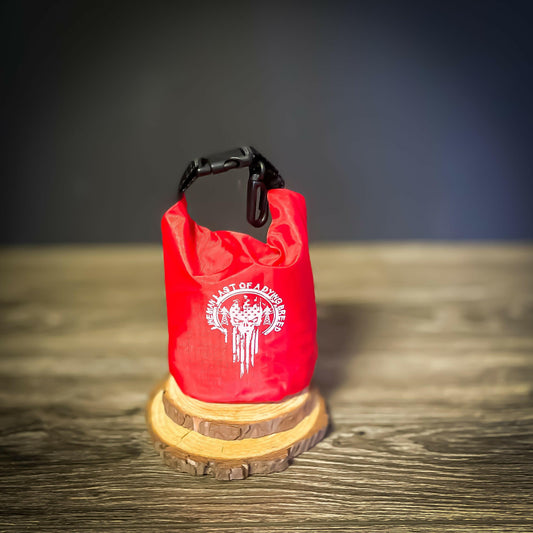 Red LineMan First Aid Kit with 'Last of a Dying Breed' white imprint on waterproof roll-top bag