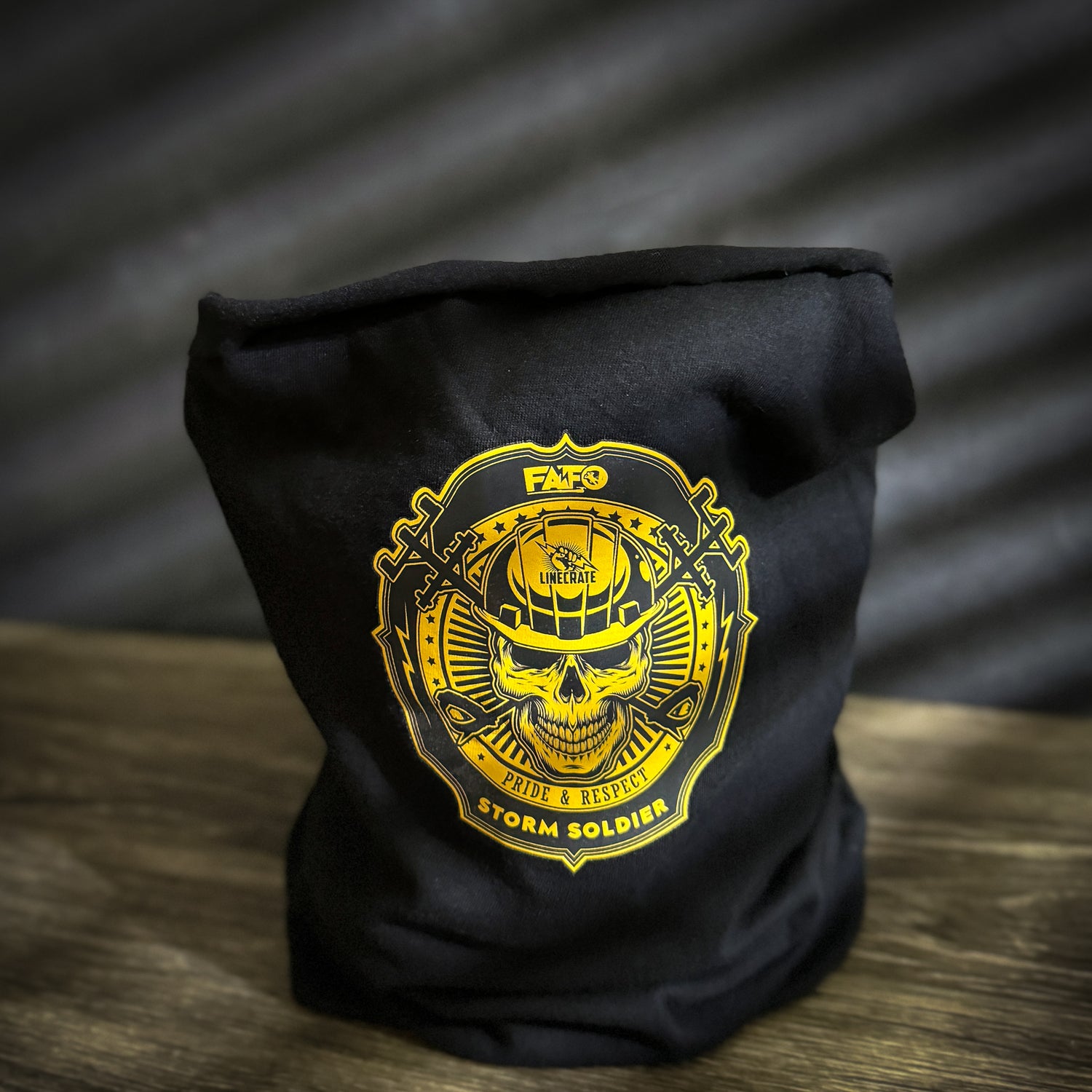 FAFO Neck Gaiter featuring bold yellow FAFO logo on a soft, black fabric designed for Power LineMen.