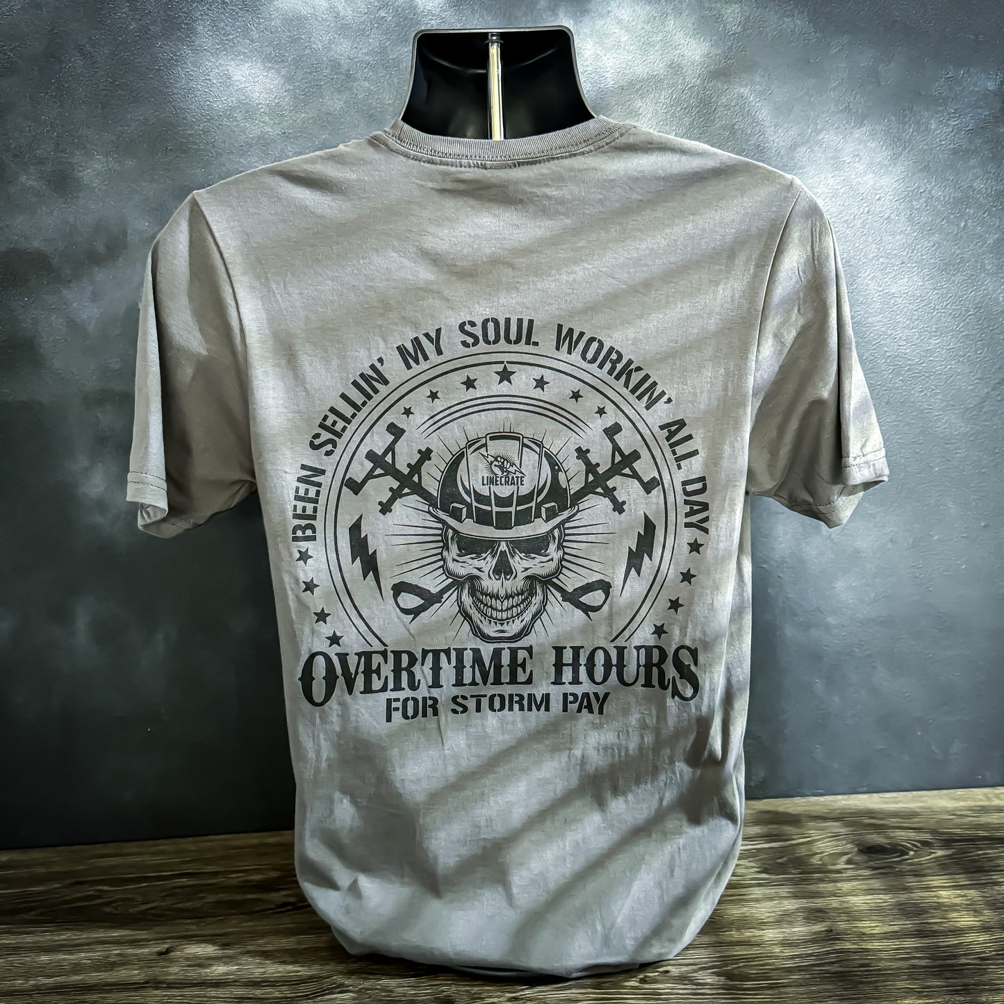 LineMan Overtime Hours For Storm Pay t-shirt in grey with skull and linemen tools design.