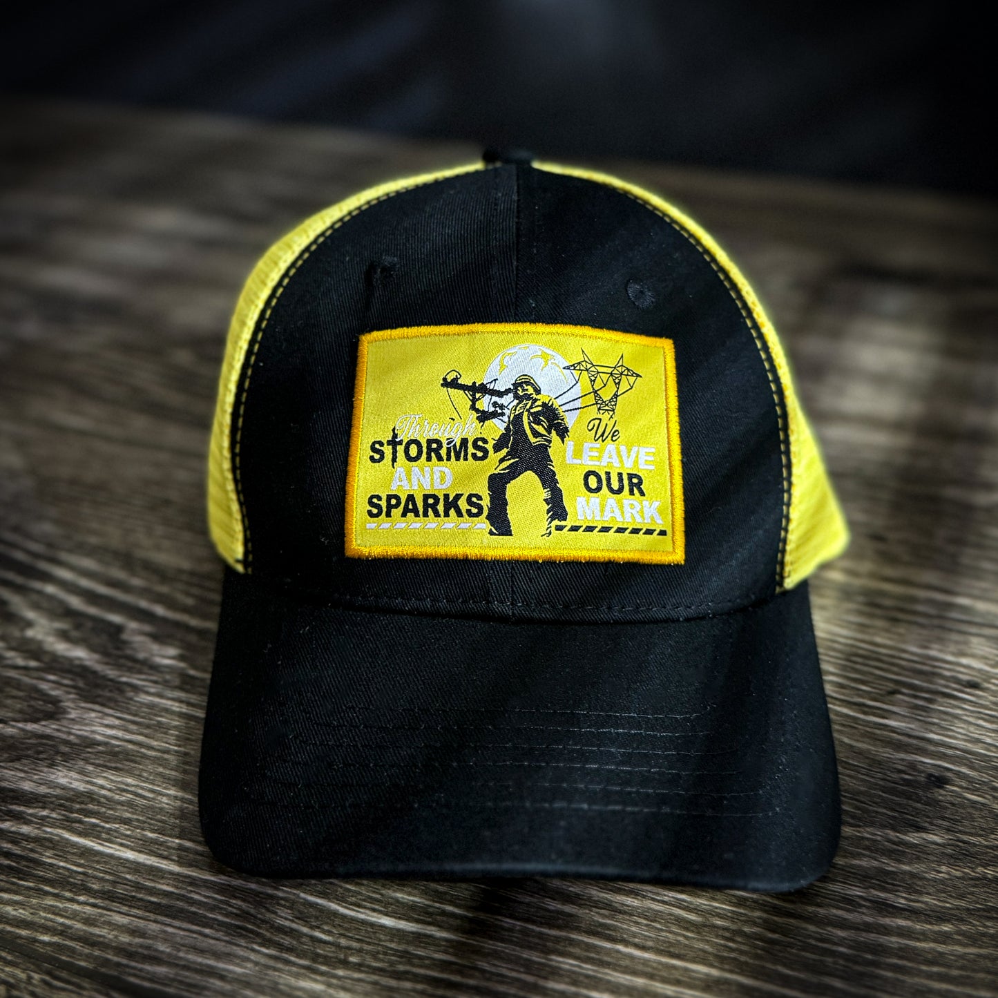 "Through Storm and Sparks We Leave Our Mark" Trucker Hat