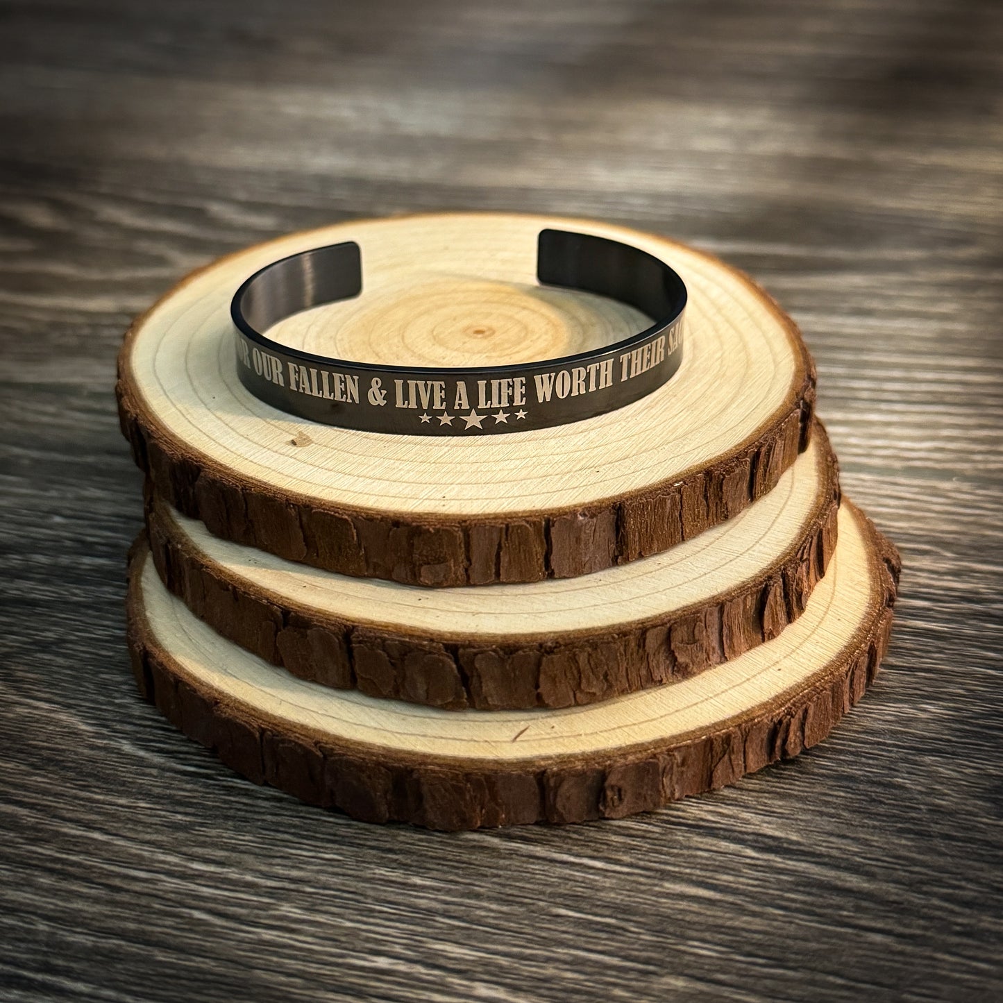 Honor Our Fallen bracelet with engraved tribute message for fallen linemen, made from stainless steel