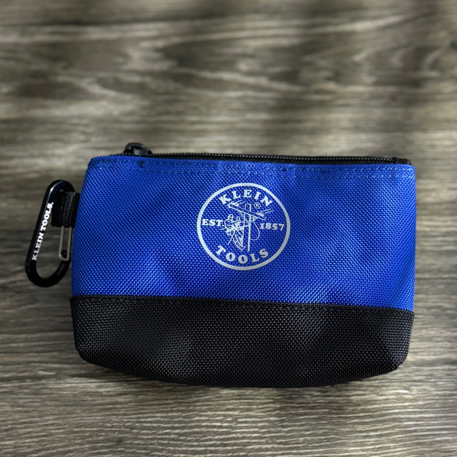 Klein Tools Stand-Up Zippered Pouch with carabiner, perfect for linemen and blue-collar workers