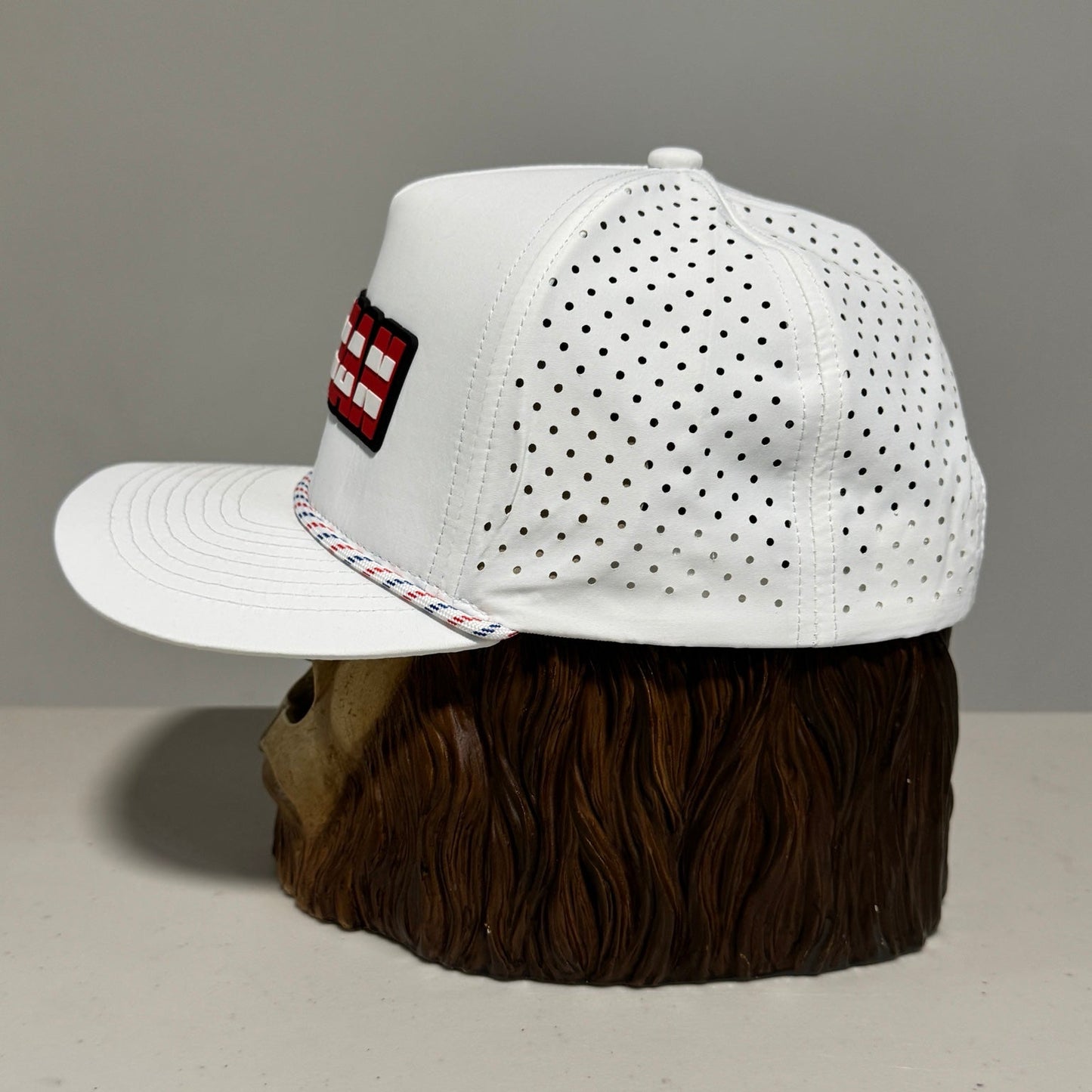 Actual side view showing perforated panels