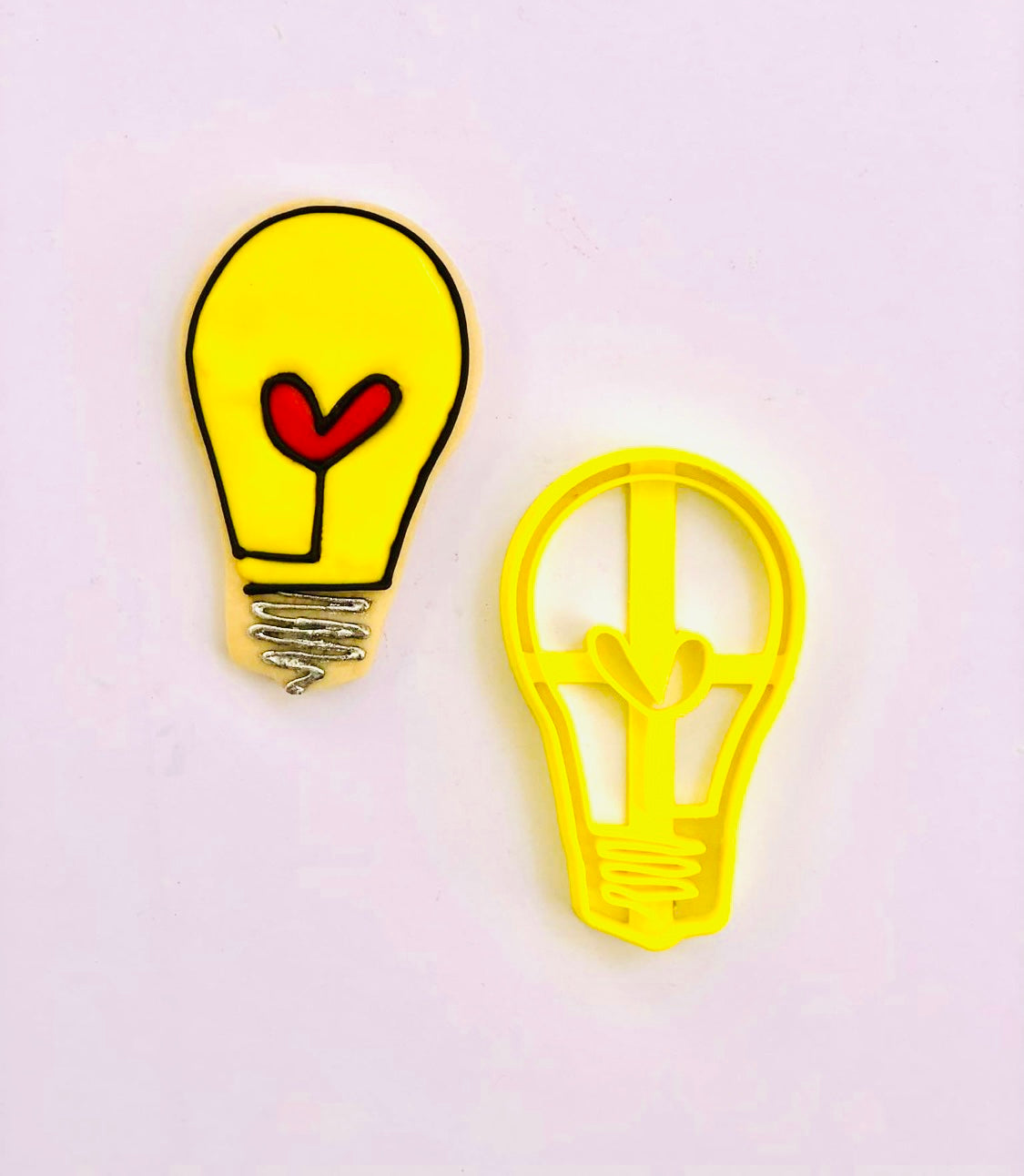 Lightbulb with heart icing example with cookie cutter